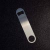 Sleek and sturdy flat brown bottle opener for effortless popping of beverages, perfect for any occasion. Get yours today!
