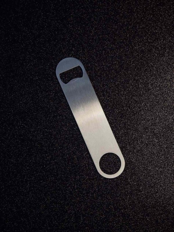 Premium flat brown bottle opener for effortless opening - a stylish and durable accessory for any occasion.