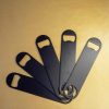 Stylish black flat bottle opener, durable and efficient tool for easy bottle opening. Perfect addition to your barware collection.
