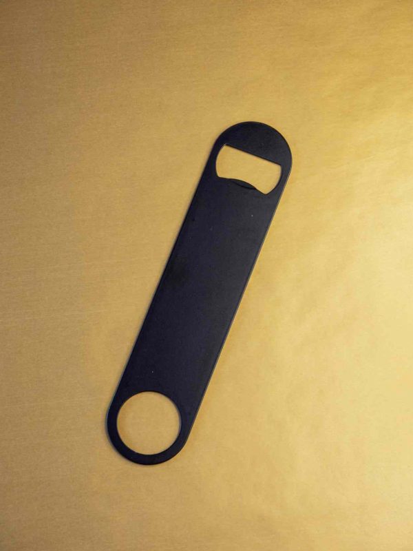 Premium black flat bottle opener for effortless opening of bottles - a sleek and stylish addition to your bar accessories collection.