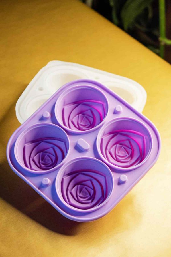 Roxa silicone tray for creating gorgeous rose-shaped treats, perfect for baking enthusiasts and party planners, high-quality and durable design.