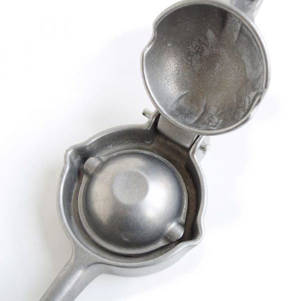 Effortlessly fresh citrus juice with Gotham Metal Manual Citrus Juicer - durable design for juicing perfection at home.