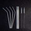 Reusable silver steel straws set, eco-friendly and stylish, perfect for cocktails and smoothies, reduce single-use plastics, durable and easy to clean.