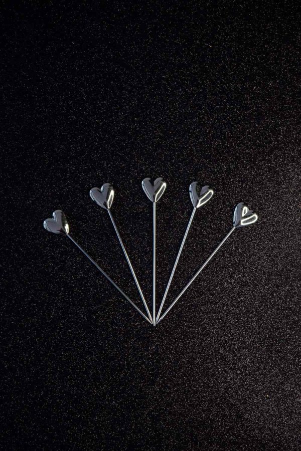 Shine at your next event with elegant silver heart cocktail sticks, perfect for adding a touch of class to your drinks. Buy online now!