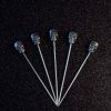 Add elegance to your cocktails with Black Caveira Cocktail Sticks - premium quality accessories for your drinks! Shop now.