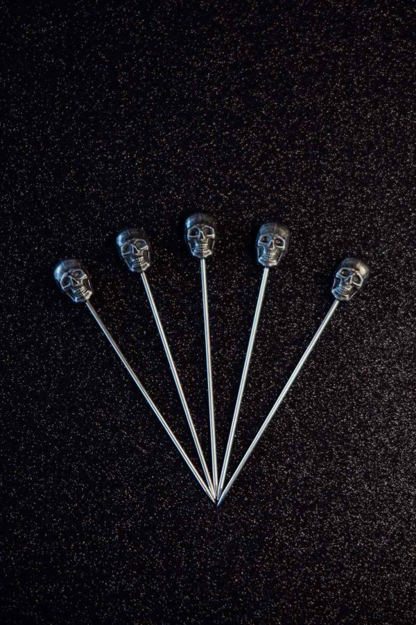 Add elegance to your cocktails with Black Caveira Cocktail Sticks - premium quality accessories for your drinks! Shop now.