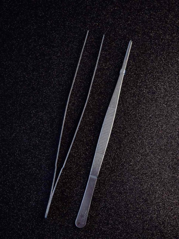 Precision steel tweezers for intricate decorations, ideal for crafts and beauty routines, buy online for ultimate precision.