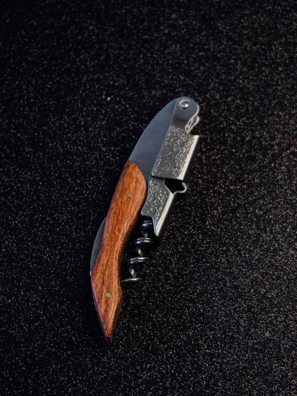 Premium waiter's corkscrew featuring a sleek wooden handle for effortless wine opening - ideal for wine enthusiasts and professionals.