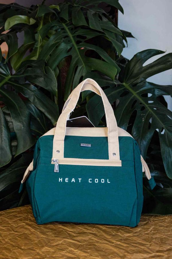 Stay cool on-the-go with our Green Insulated Cooler Bag - perfect for picnics, beach trips, and outdoor adventures. Shop now for chilled refreshment!