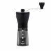 Experience precision grinding with the HARIO Mini Mill + Grinder, perfect for achieving fresh coffee grounds at home.